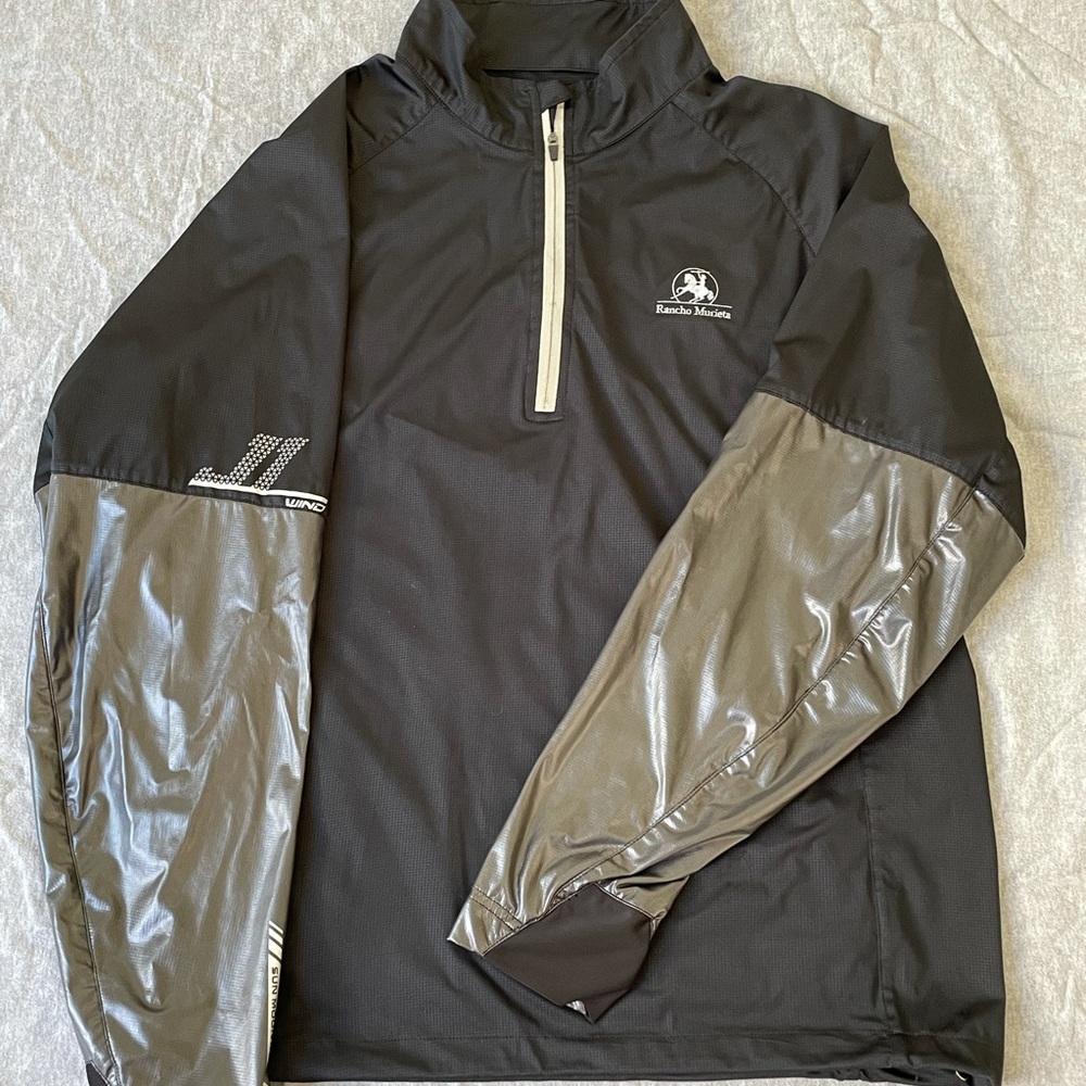 Lightweight golf windbreaker.